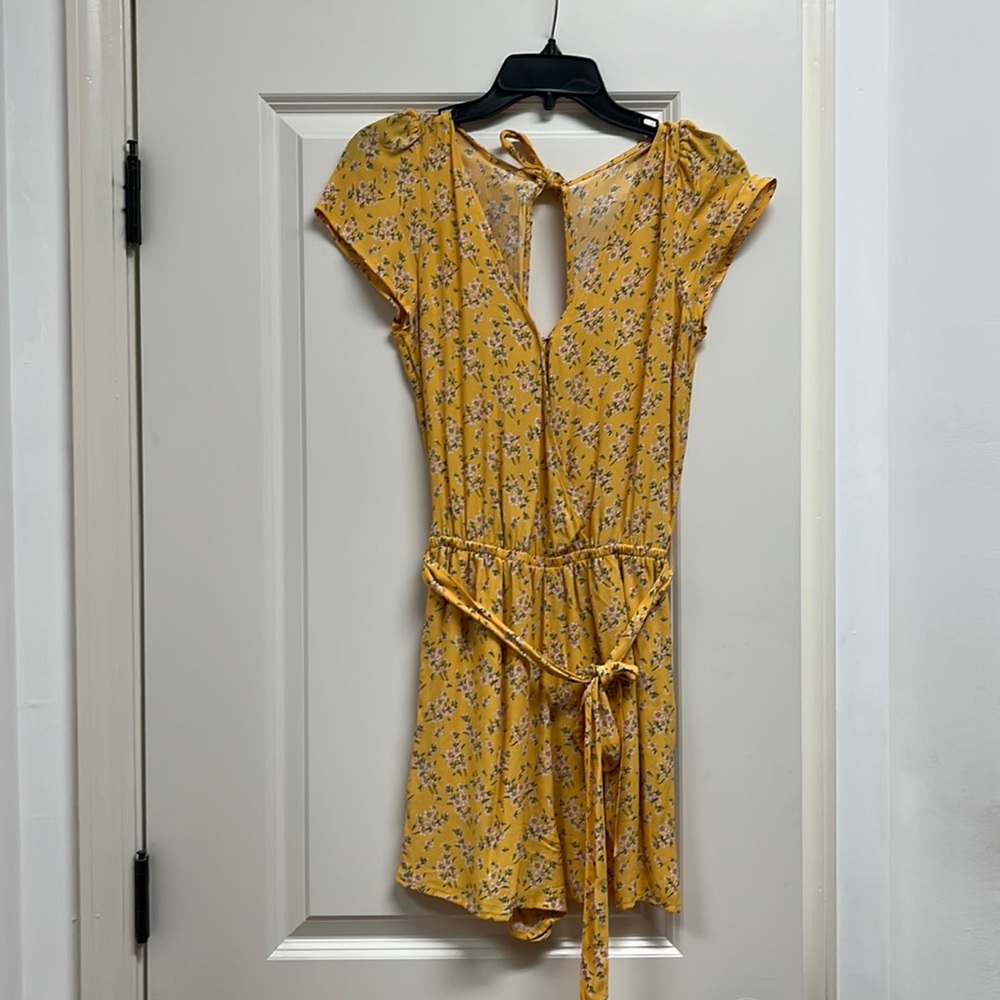 American eagle yellow with flowers romper. Size extra small. New with tags